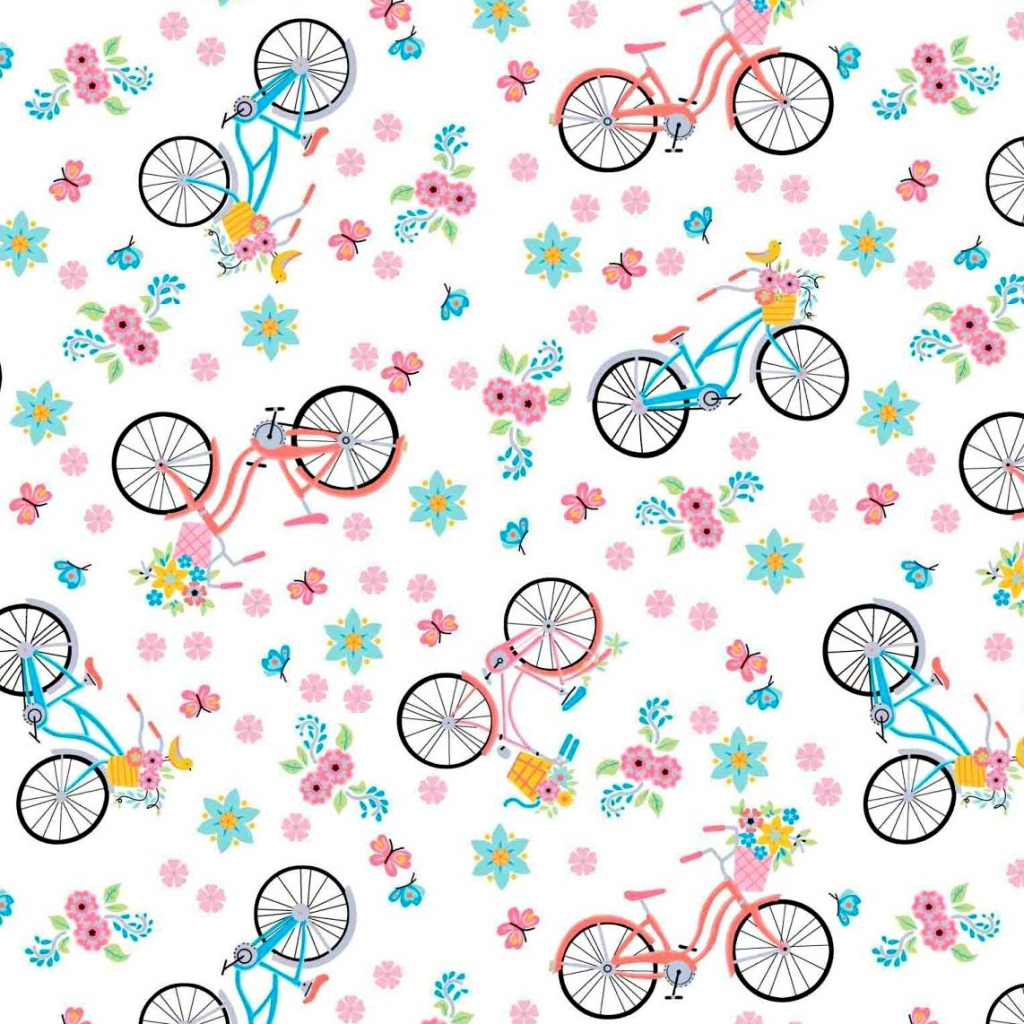Tkanina w rowerki różowo niebieskie na białym tle