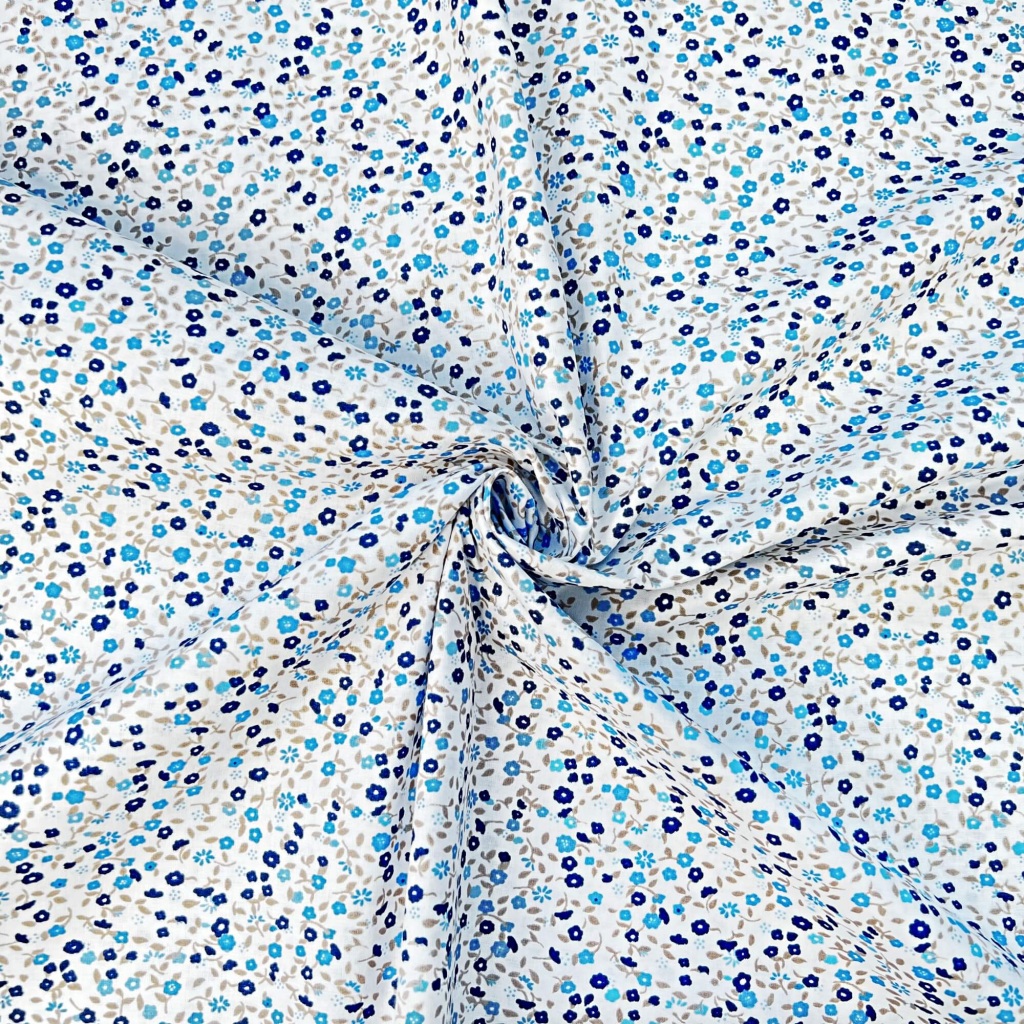 Tkanina bawełniana łączka niebiesko granatowa na białym tle