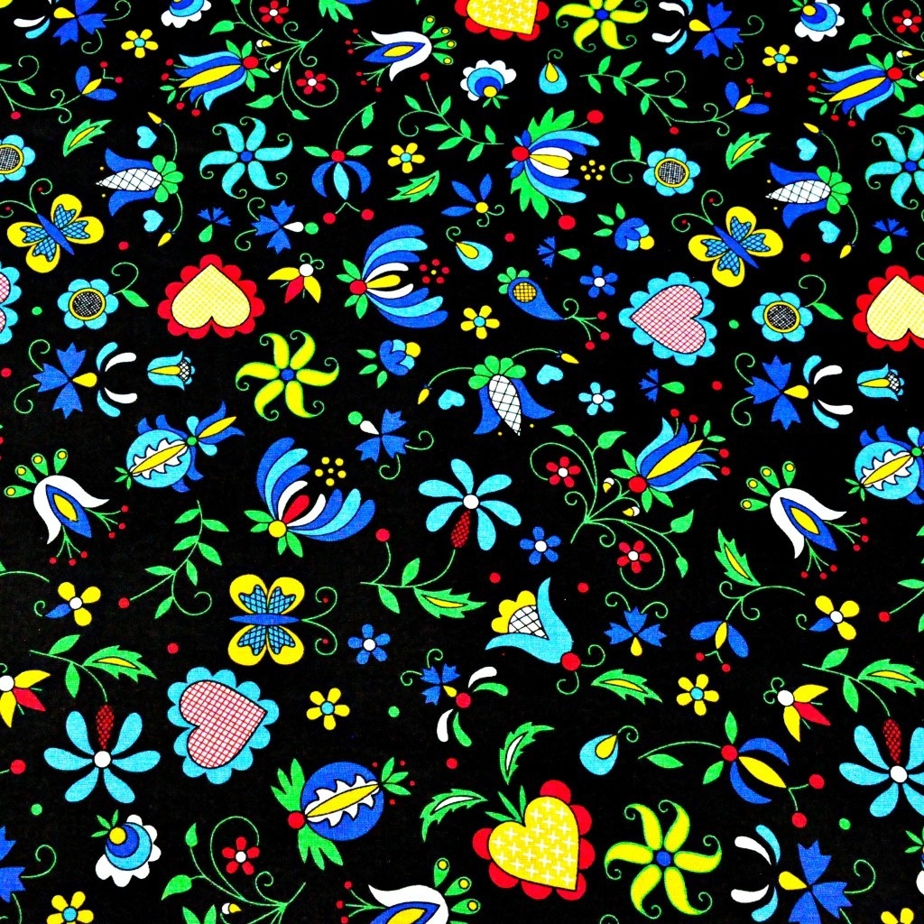 Tkanina wzór kaszubski niebieski na czarnym tle