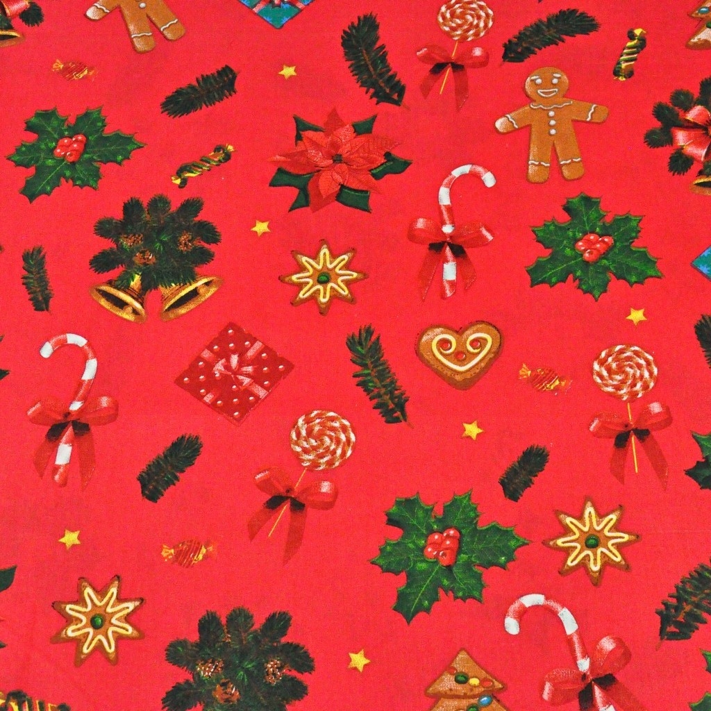 Tkanina wzór świąteczny z ciasteczkami na czerwonym tle