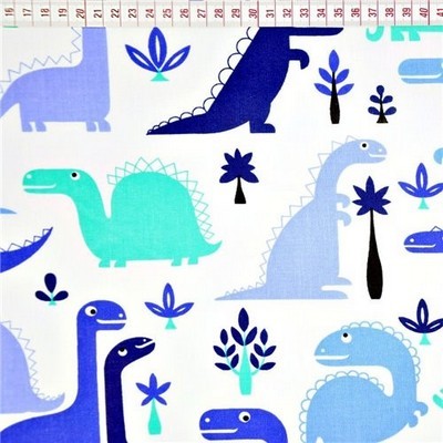 Tkanina w dinozaury niebieskie na białym tle 